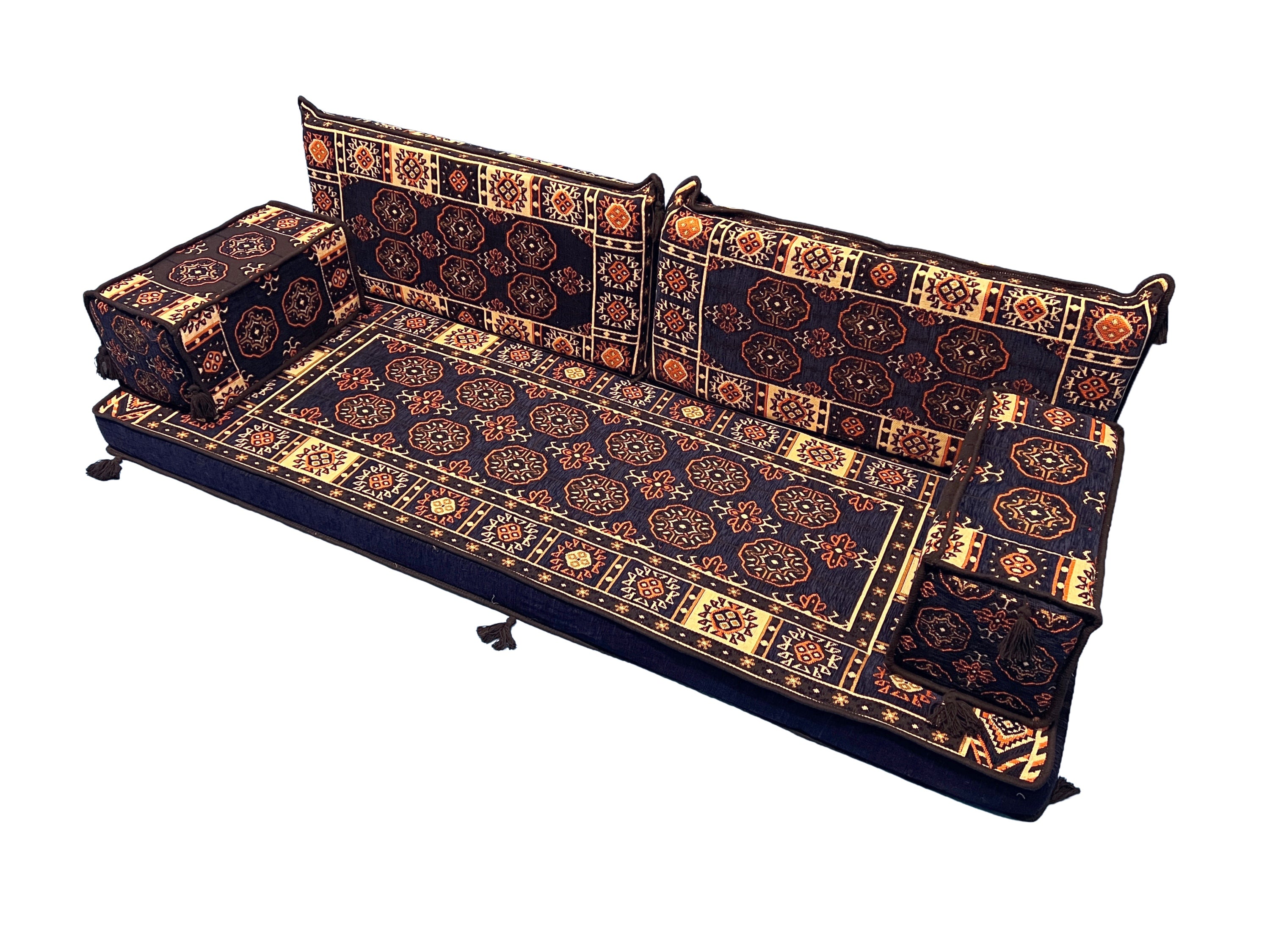 A low-profile floor cushion loveseat with a dark navy blue base and intricate geometric and floral patterns in gold, orange, and red, shown on a plain white background.
