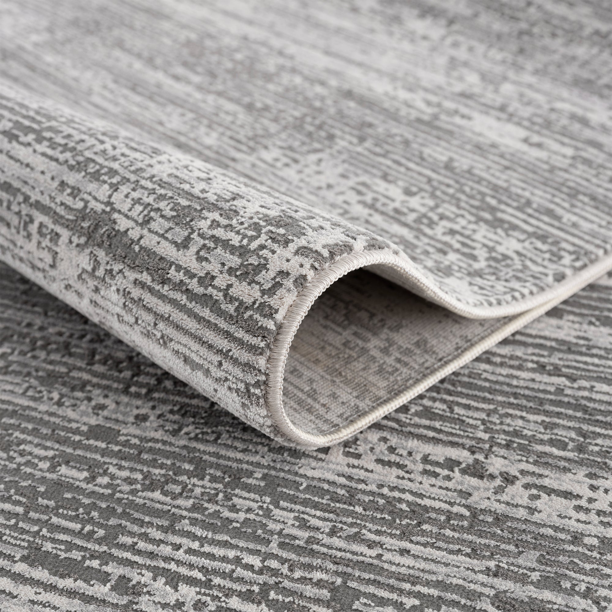 Smyrna Subtle Minimalist Rug in Muted Gray, Silver and White
