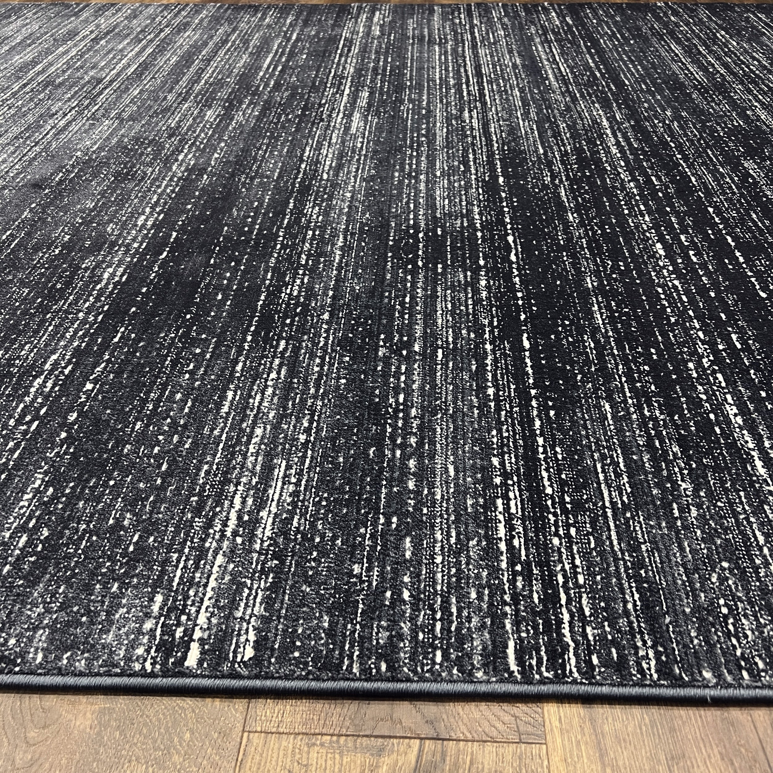 Unity Charcoal Blue Soft Rug with Sleek Minimalist Design