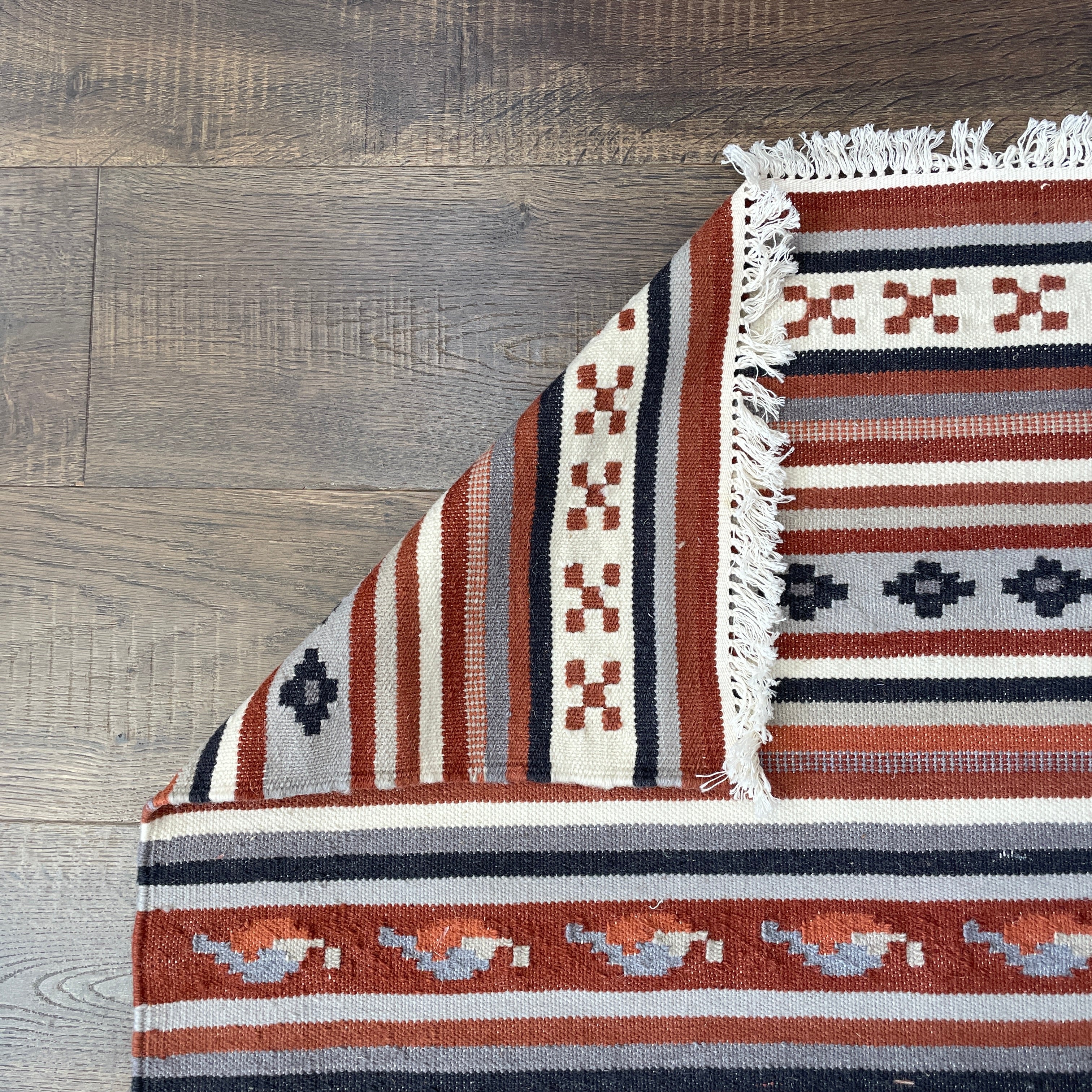 5'7"x8' Hand-Knotted Wool Kilim Rug | Terracotta and Charcoal Striped Flatweave