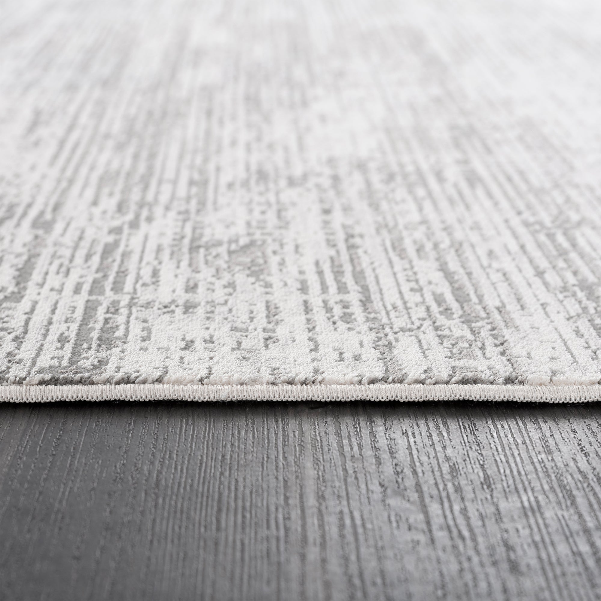 Smyrna Subtle Minimalist Rug in Muted Gray, Silver and White