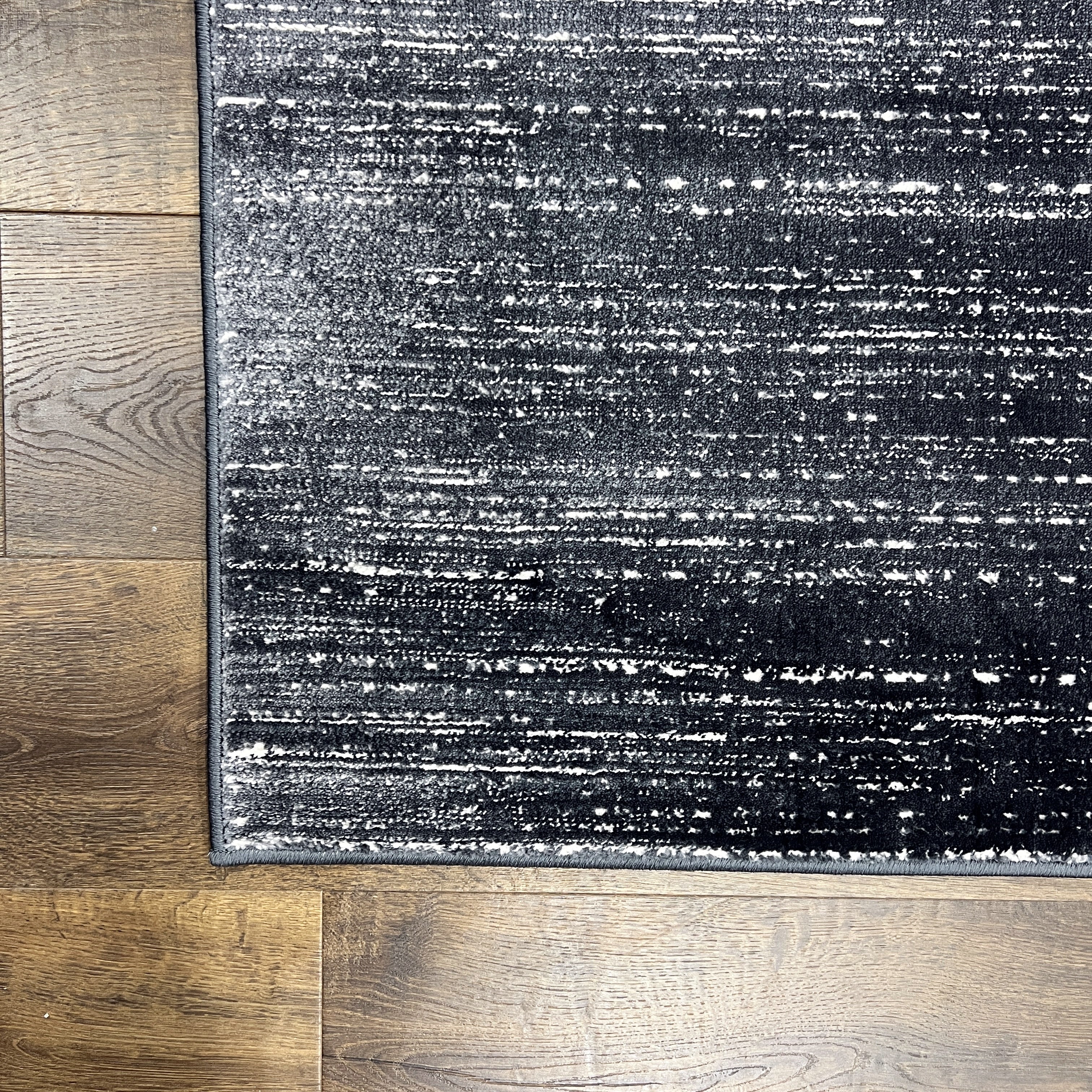 Unity Charcoal Blue Soft Rug with Sleek Minimalist Design