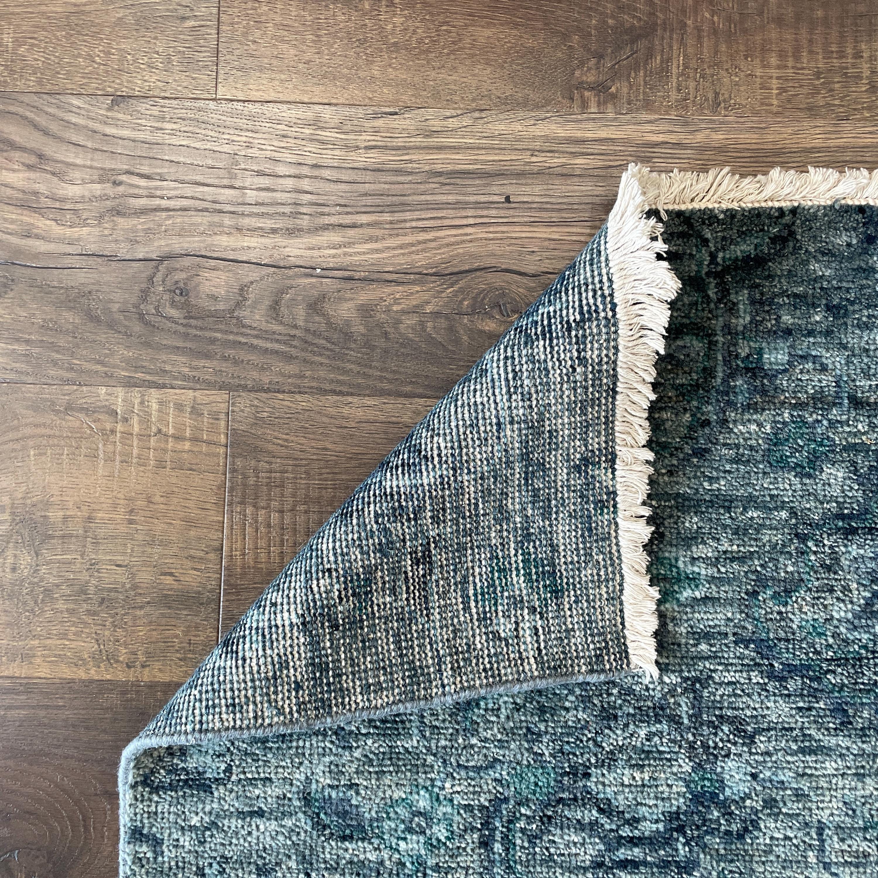 Handmade Distressed Blue Turkish Rug: Vintage Boho Accent (1'10"x3')