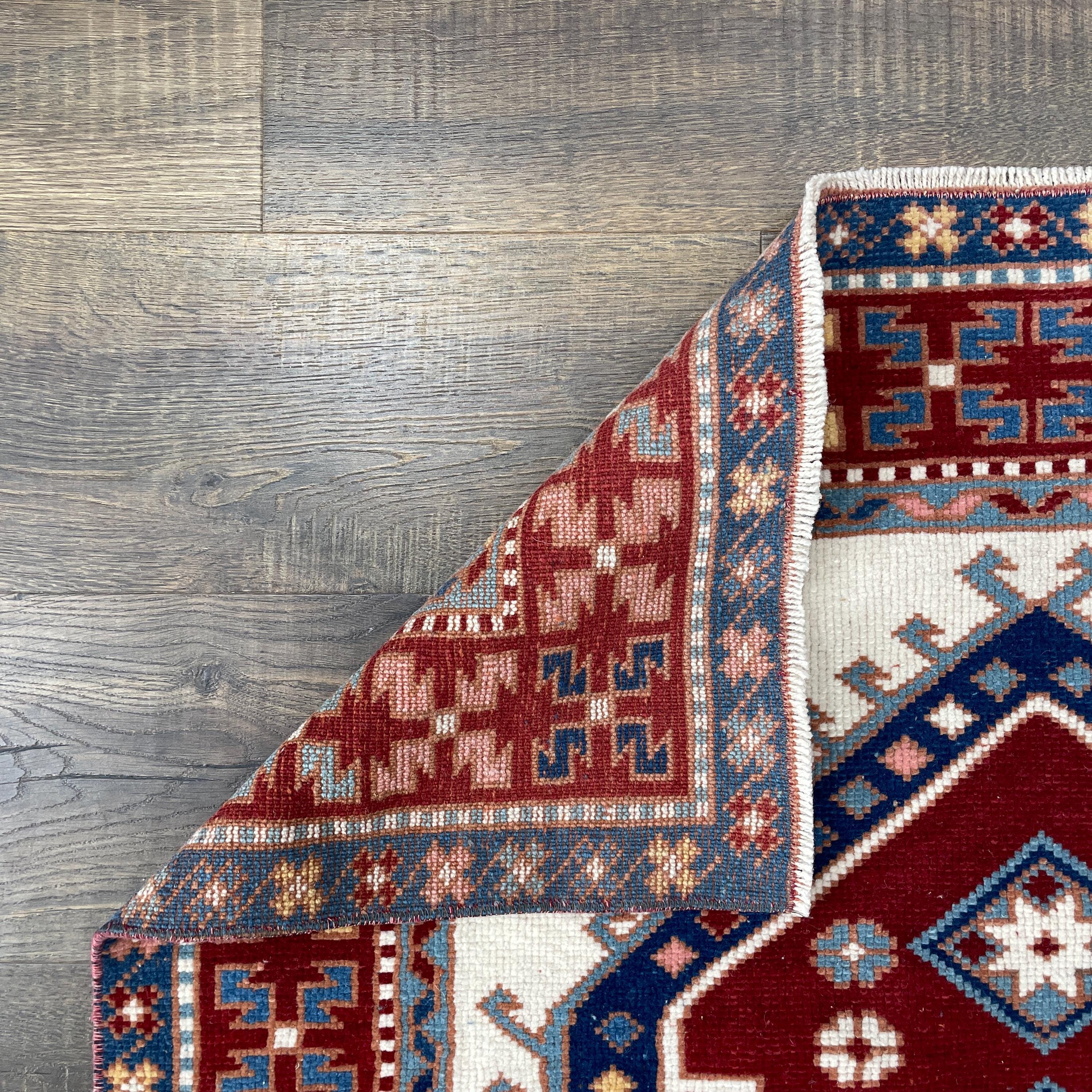 Handmade Turkish Wool Rug: Vintage Red Geometric Medallion
