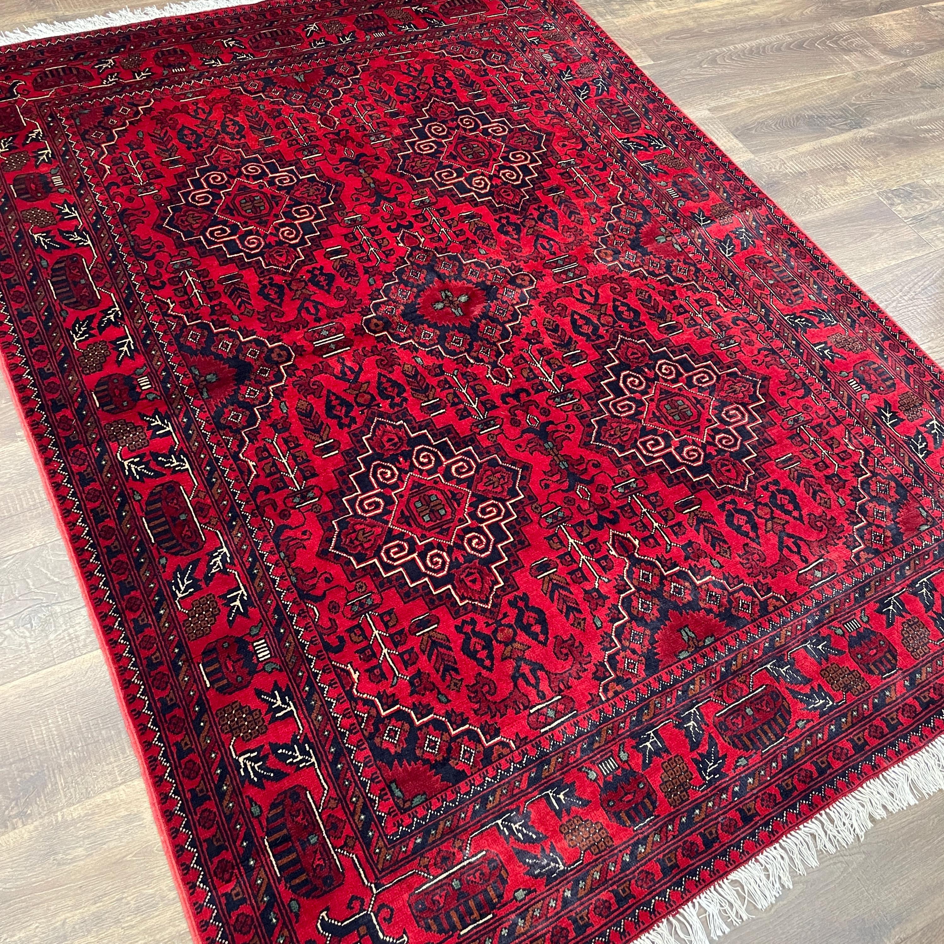 Handmade Red Wool Rug: 5' x 6'9" Turkish Tribal Design