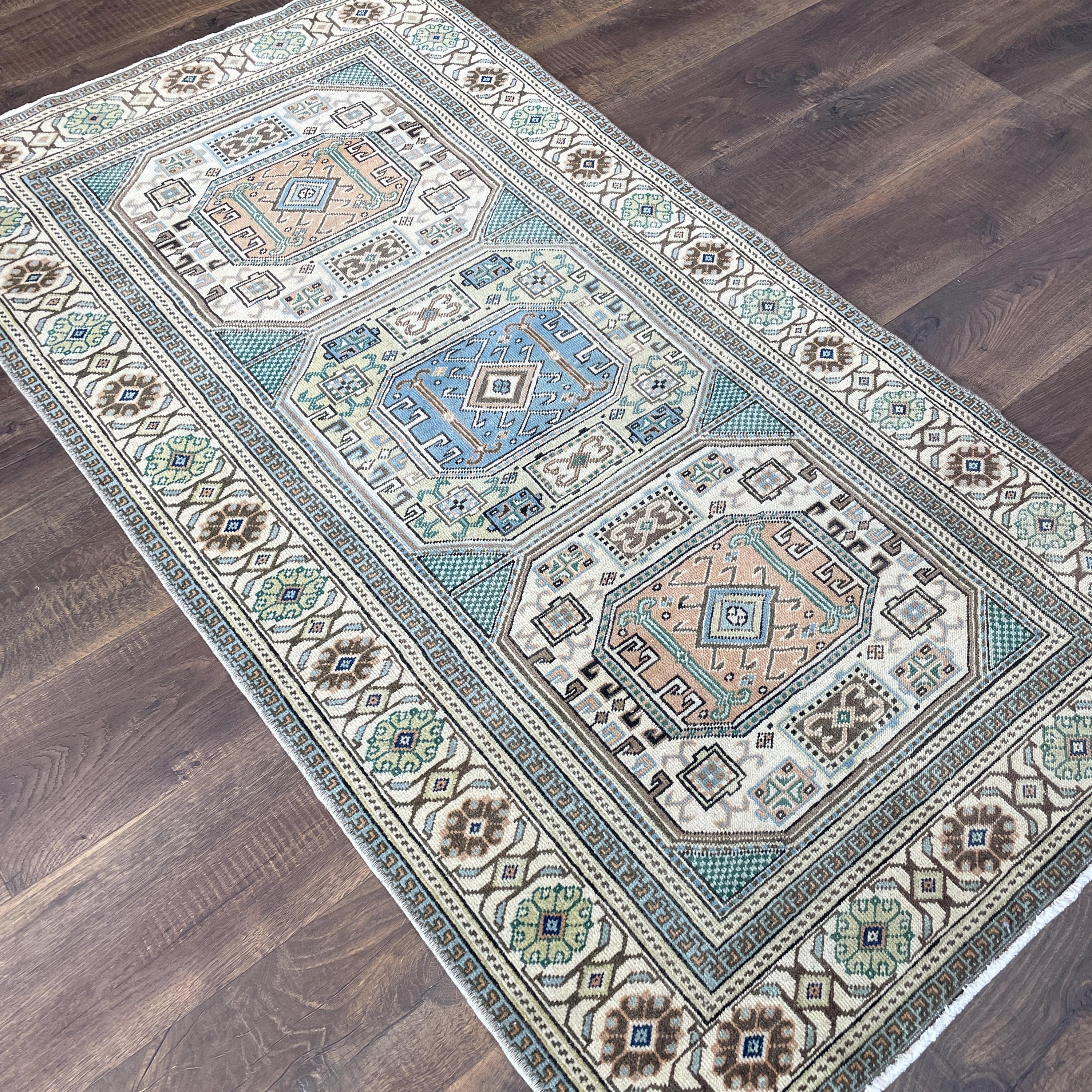 Handmade Turkish Wool Rug: Vintage Geometric Boho Accent (3' x 5'6")