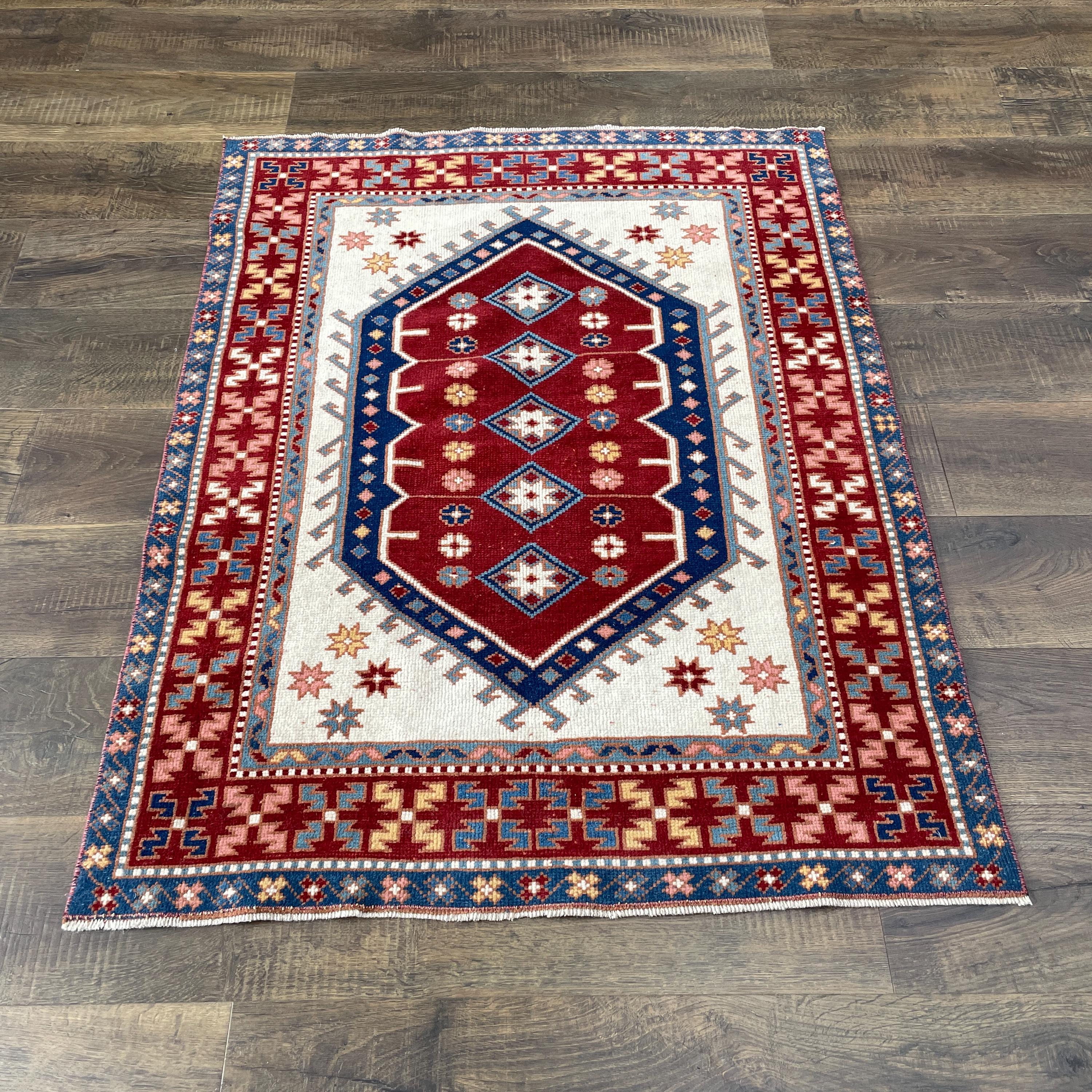 Handmade Turkish Wool Rug: Vintage Red Geometric Medallion
