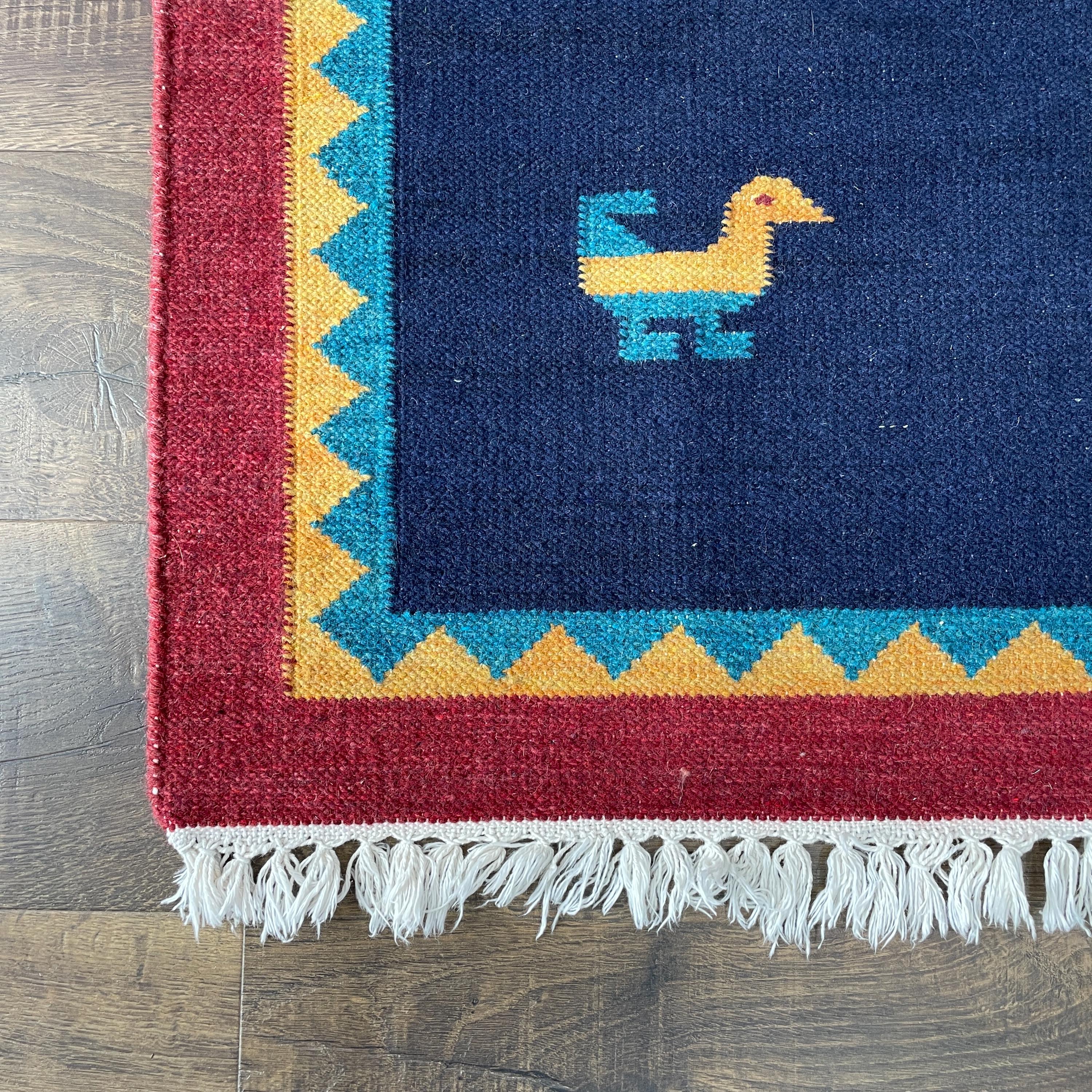 Handmade Wool Kilim Rug: Navy Blue Folk Art Bird Motif (3'2"x6'4")